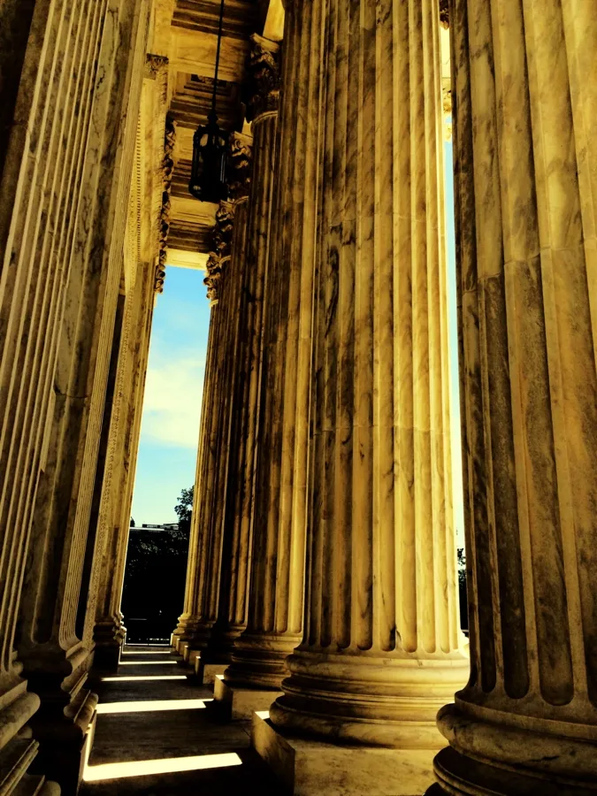 Classical marble columns of a courthouse exterior